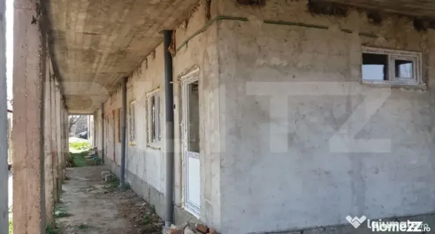 CLADIRE LA ROSU GAESTI, AFACERE