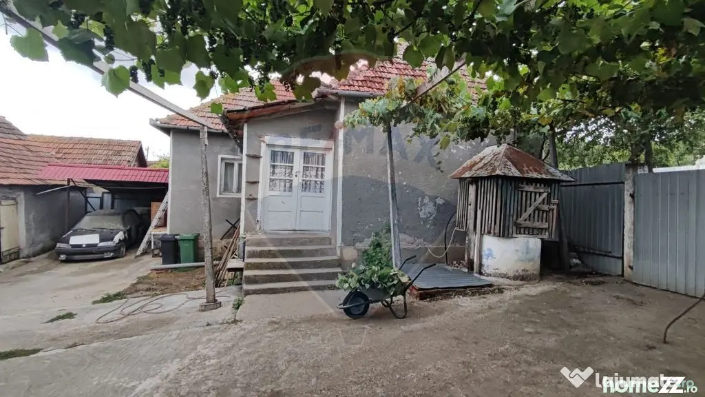 Casă cu 4 camere si teren de vânzare in com. Husasau de...