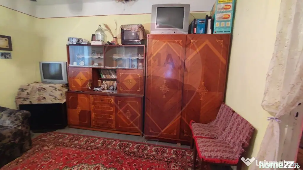 Casă cu 4 camere si teren de vânzare in com. Husasau de...