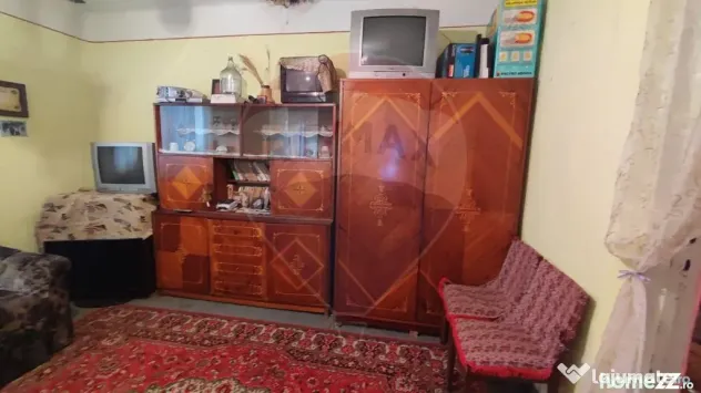 Casă cu 4 camere si teren de vânzare in com. Husasau de...