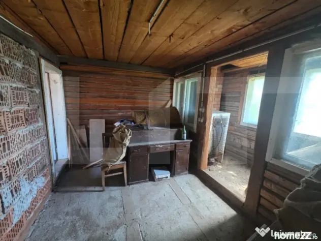 Casă dublă în comuna Hătuica, chiar în vecinătatea bă