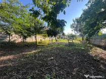 Teren intravilan 1010 mp cu casa batraneasca, magazie, beci,