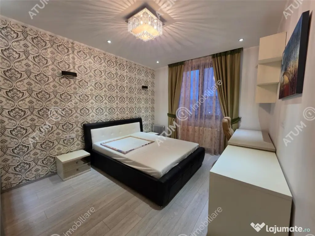 Casa 4 camere 3 bai terasa si teren 250 mp zona Octavian Gog