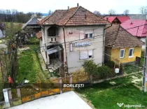 Casă din cărămidă cu teren generos de 2460 mp și ane...