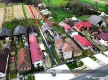 Casă din cărămidă cu teren generos de 2460 mp și ane...