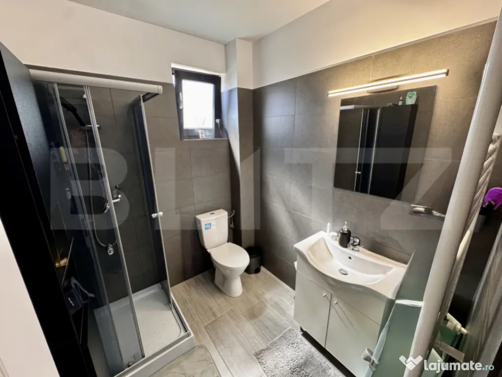 Apartament tip studio cu terasa, curte proprie generoasă–