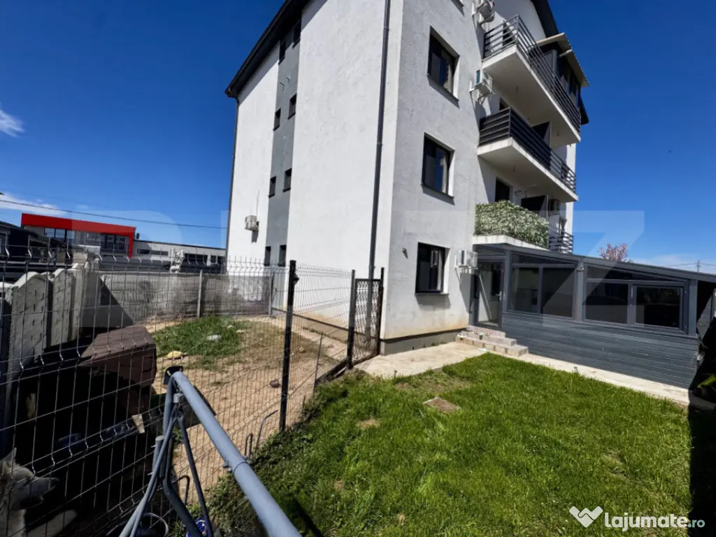 Apartament tip studio cu terasa, curte proprie generoasă–