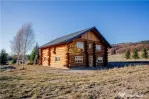 Casa din lemn rotund (Izvoru Muresului, str. Garii)