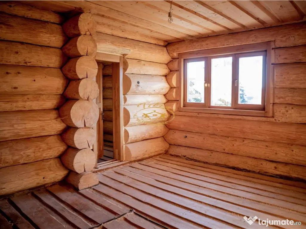 Casa din lemn rotund (Izvoru Muresului, str. Garii)