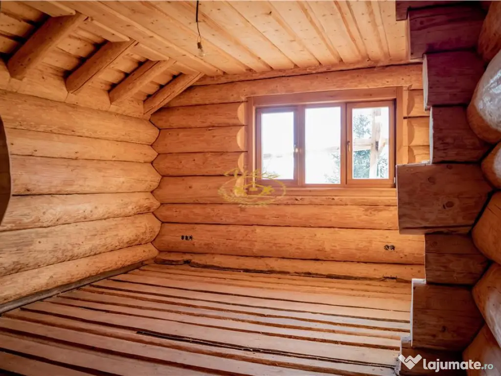 Casa din lemn rotund (Izvoru Muresului, str. Garii)