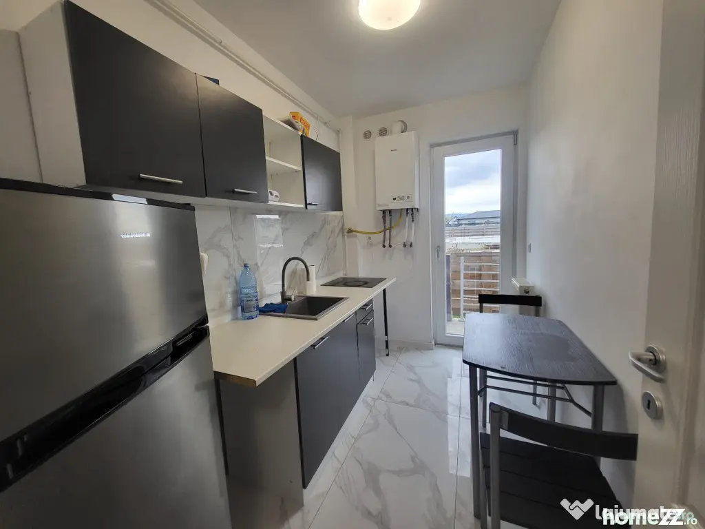 Apartament cu o camera loc de parcare si gradina mutare ime