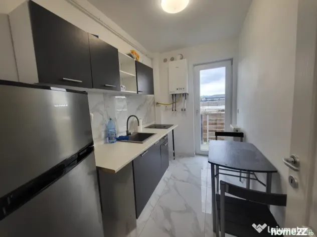 Apartament cu o camera loc de parcare si gradina mutare ime