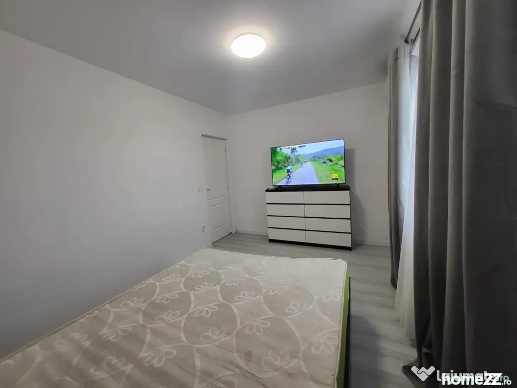 Apartament cu o camera loc de parcare si gradina mutare ime