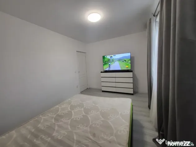 Apartament cu o camera loc de parcare si gradina mutare ime