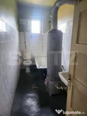 Casă de vânzare, cu teren în suprafață de 400 mp 