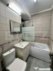 Apartament cu 2 camere, parter, centrala si AC, zona central 