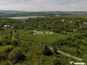 Teren compact intravilan 8000 mp vedere spre Lac, utilităț 
