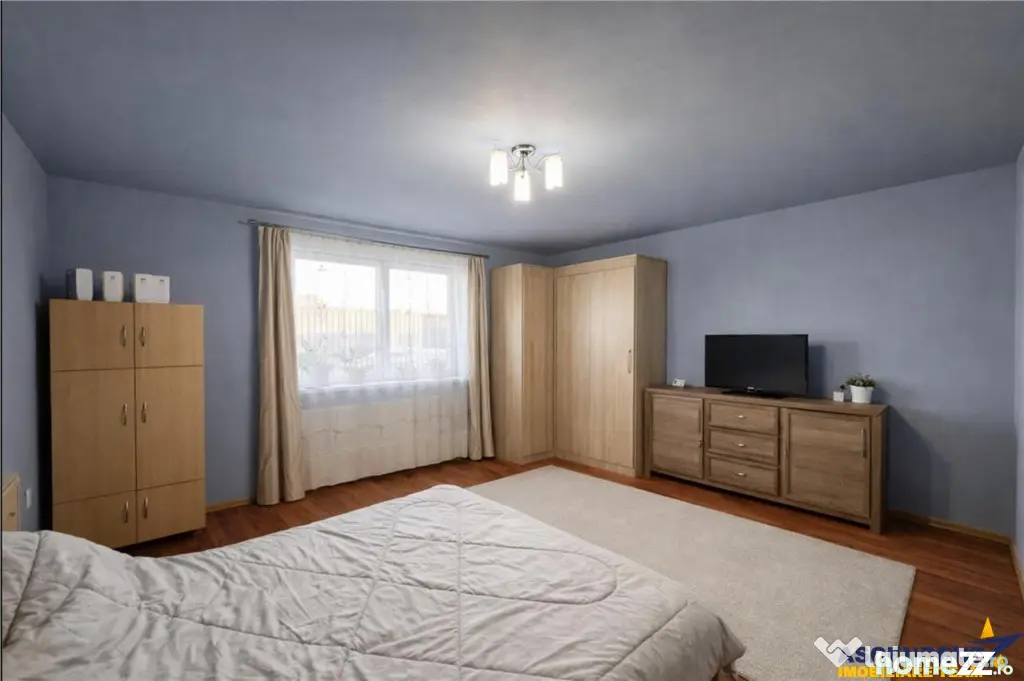 Nivel in casa cu 2 apartamente,145 mp utili teren 338mp, Gh
