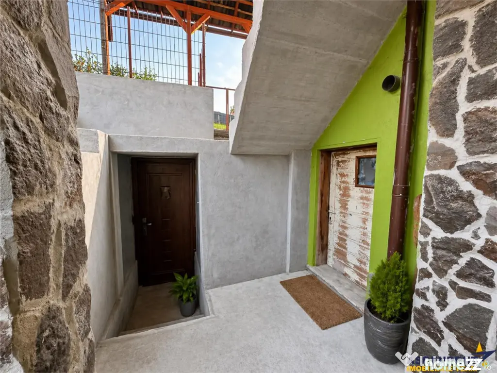 Nivel in casa cu 2 apartamente,145 mp utili teren 338mp, Gh