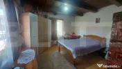 Casă cochetă din lemn masiv cu teren și livadă – lini? 