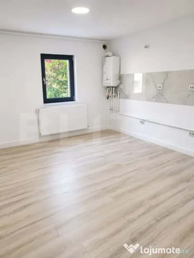 Spatiu comercial parter înalt+ apartament 2 camere-locuinț