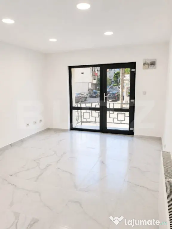 Spatiu comercial parter înalt+ apartament 2 camere-locuinț