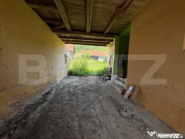 De vanzare casa intr-o zona de deal relaxanta