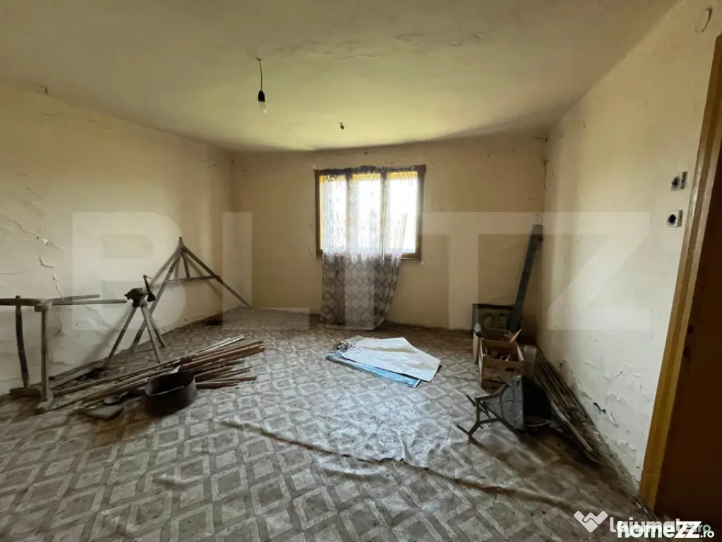 De vanzare casa intr-o zona de deal relaxanta