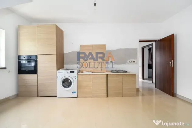 Casă din 2010 (3 dormitoare, două băi și garaj)