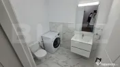 Apartament modern cu 3 camere, 2 băi și balcon generos – 