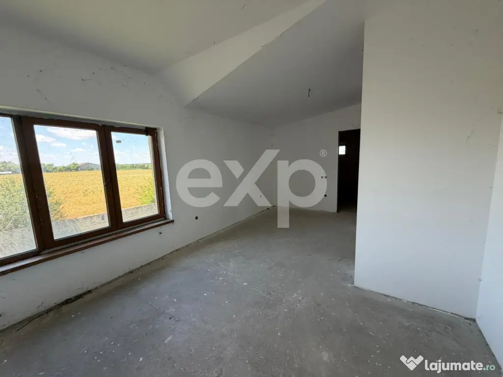 Casa spatioasa cu 5 dormitoare, Teren 1000mp, Butimanu -Ungu