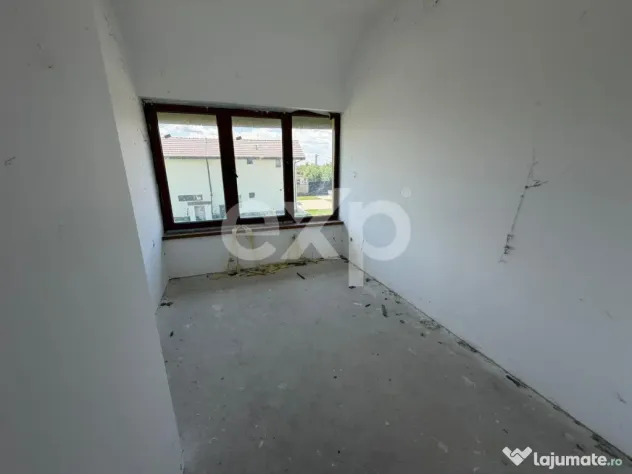 Casa spatioasa cu 5 dormitoare, Teren 1000mp, Butimanu -Ungu