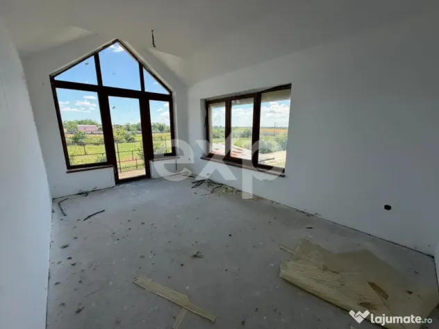 Casa spatioasa cu 5 dormitoare, Teren 1000mp, Butimanu -Ungu