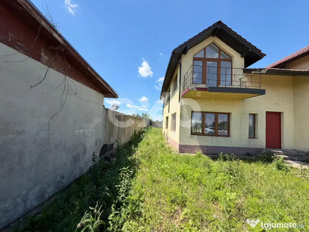 Casa spatioasa cu 5 dormitoare, Teren 1000mp, Butimanu -Ungu