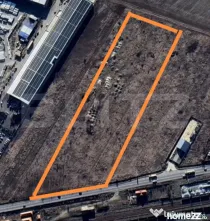 Teren intravilan 1.2ha, deschidere 53 m la DE, langa QFort