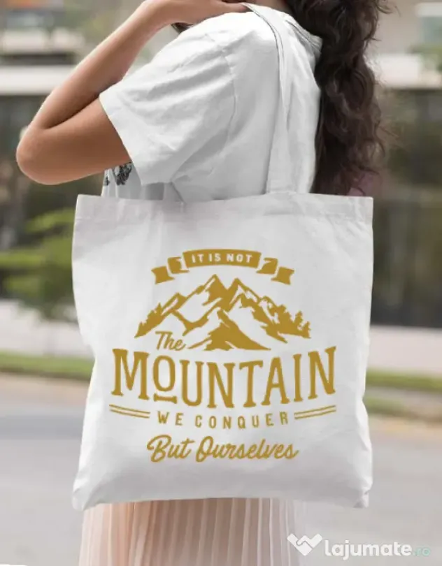 Sacosa din panza Its not the mountain we conquer Alb