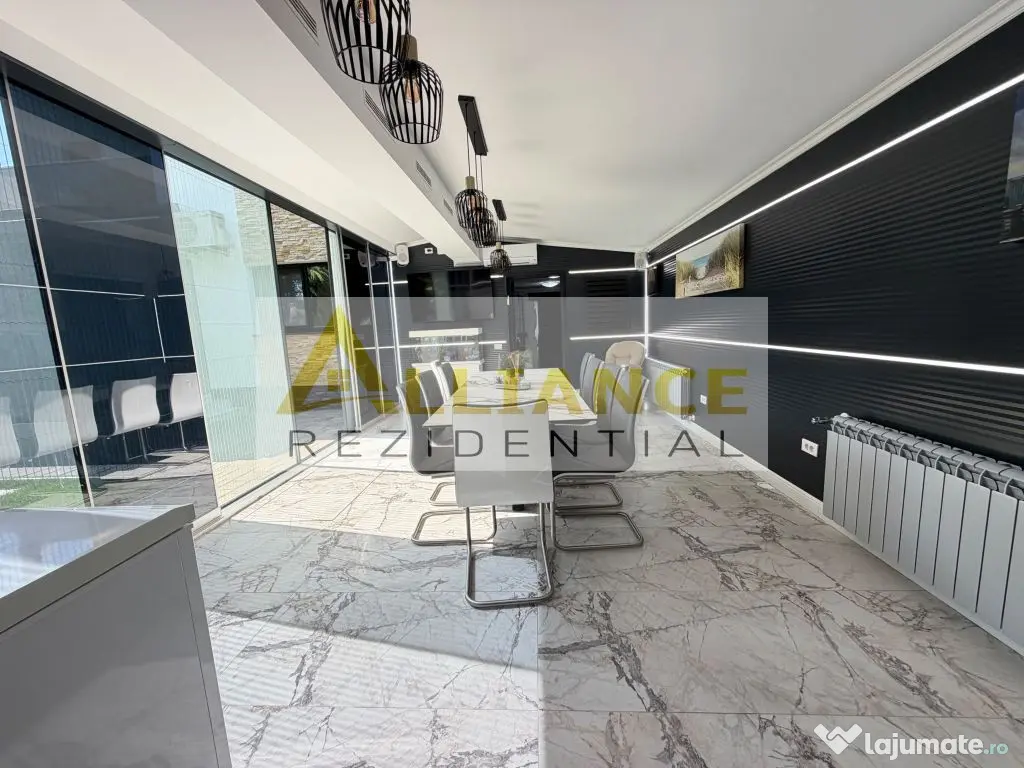 Casa P+1+M cu teren de 650 mp, piscina si curte complet a...