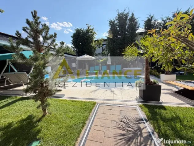 Casa P+1+M cu teren de 650 mp, piscina si curte complet a...