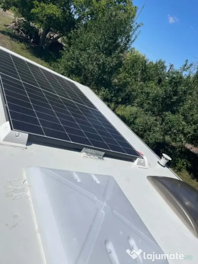 Vând (sau schimb cu autorulotă) rulotă Knaus cu două zone, panou 450 kw