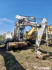Brat excavator pe roti Case WX145 