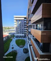 De închiriat: Apartament modern 2 camere + Parcare subteran 