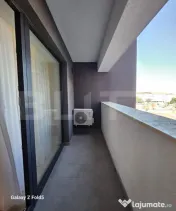 De închiriat: Apartament modern 2 camere + Parcare subteran 