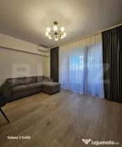De închiriat: Apartament modern 2 camere + Parcare subteran 