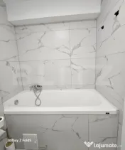 De închiriat: Apartament modern 2 camere + Parcare subteran 