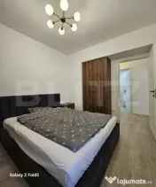 De închiriat: Apartament modern 2 camere + Parcare subteran 