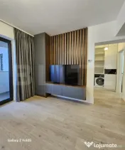 De închiriat: Apartament modern 2 camere + Parcare subteran 
