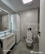 De închiriat: Apartament modern 2 camere + Parcare subteran 