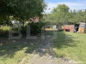 Casă cu 4 camere și un teren de 2500 mp 