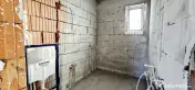COMUNA BERCENI - CASĂ 5 CAMERE, 300 MP TEREN, SEMIFINISATĂ 