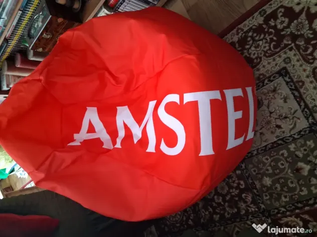 Vand fotoliu puf nou marca Amstel impreuna cu set de 6 pahare noi marca Amstel.